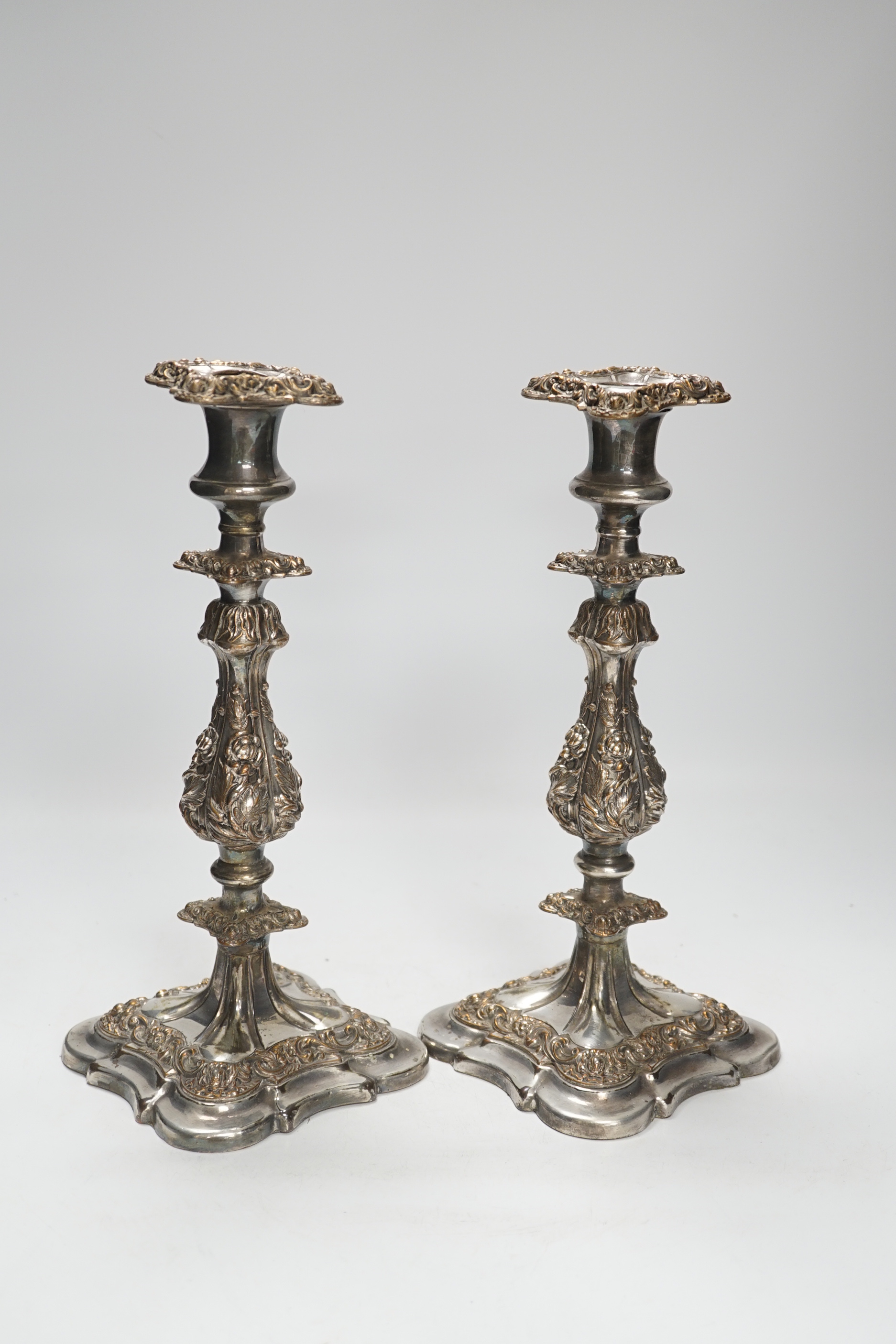 A pair of silver plate Sheffield candlesticks, 31cm high